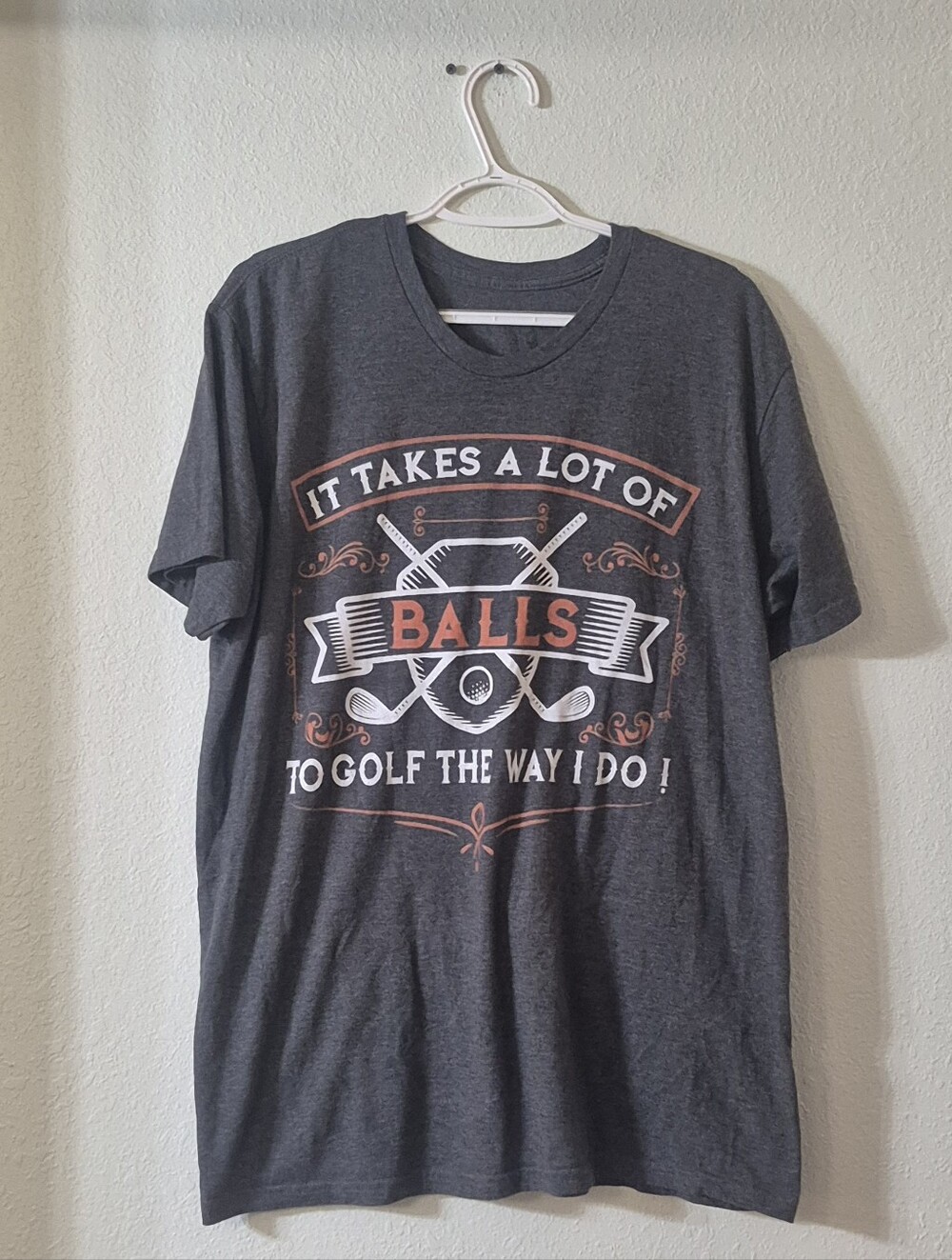 Men's Dark Gray Short Sleeve Graphic Golf Tee with Orange Accent